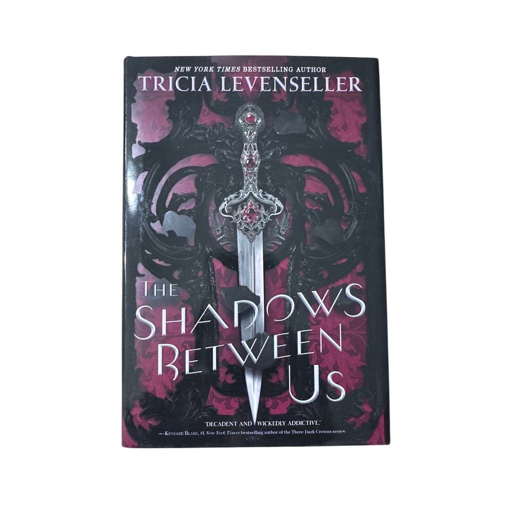 The Shadows Between Us by Tricia Levenseller Hardcover Book Sprayed Edges